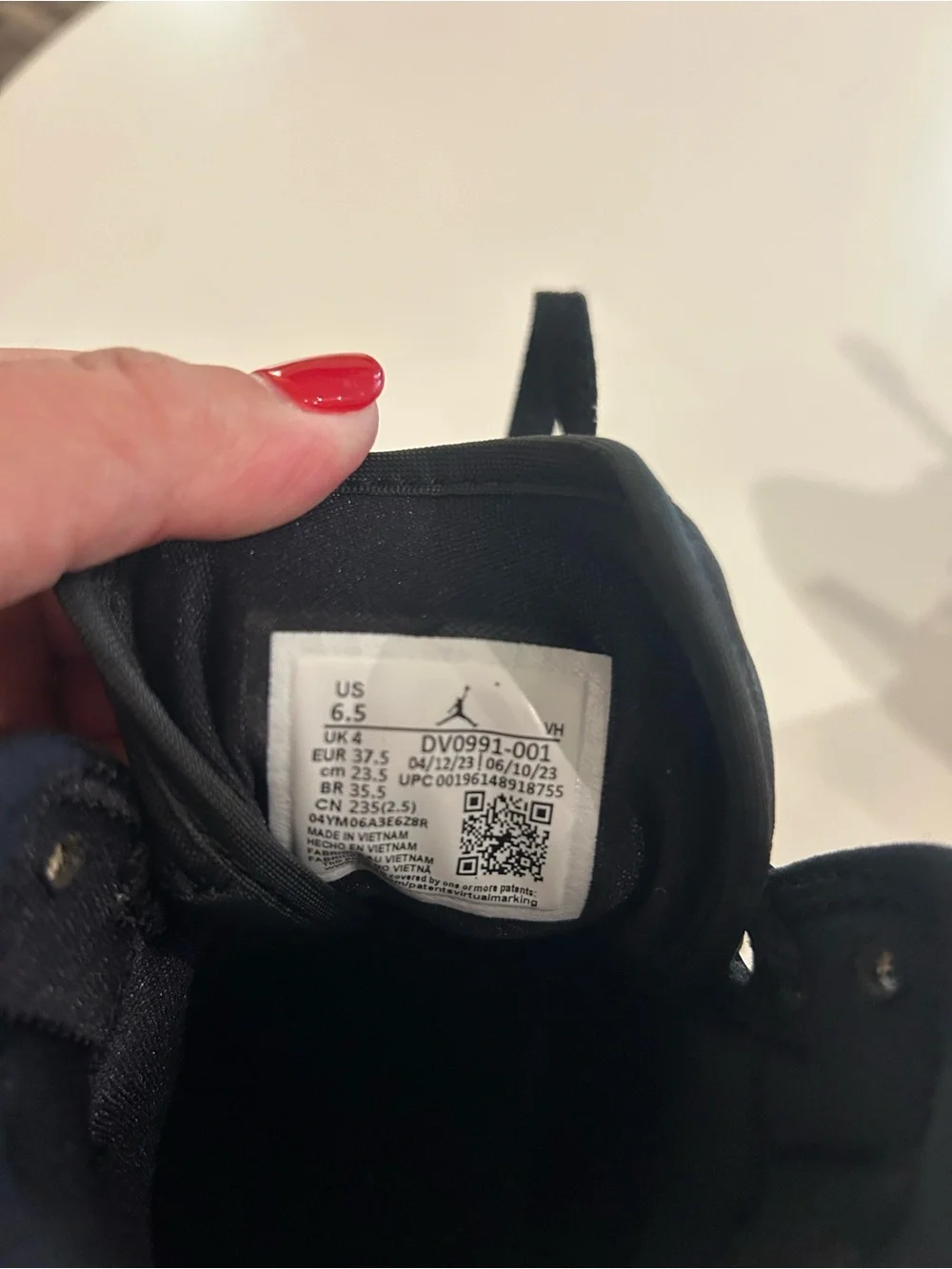 Nike Black and White Mid-Top Sneakers